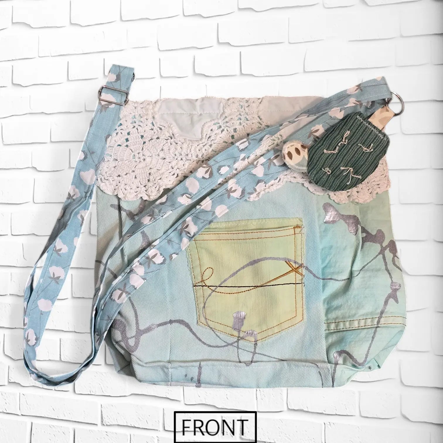 FRONT VIEW OF BLUE CROSSBODY