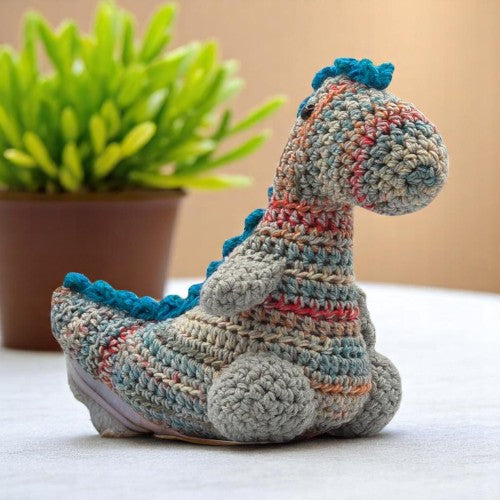 DINOSAUR TOY FACING RIGHT multi colored blue red cream