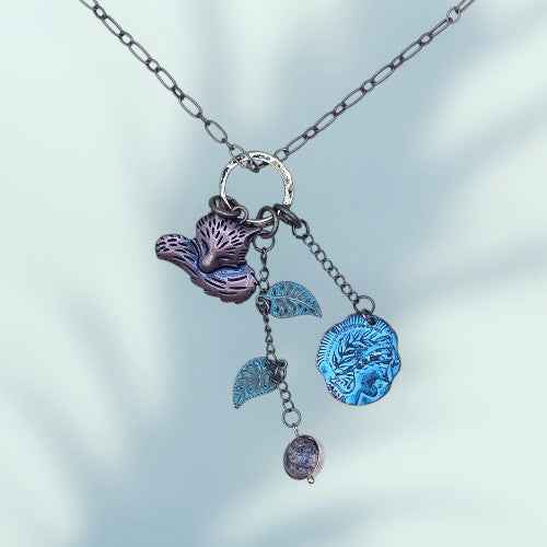 A long chain necklace with a cute fox