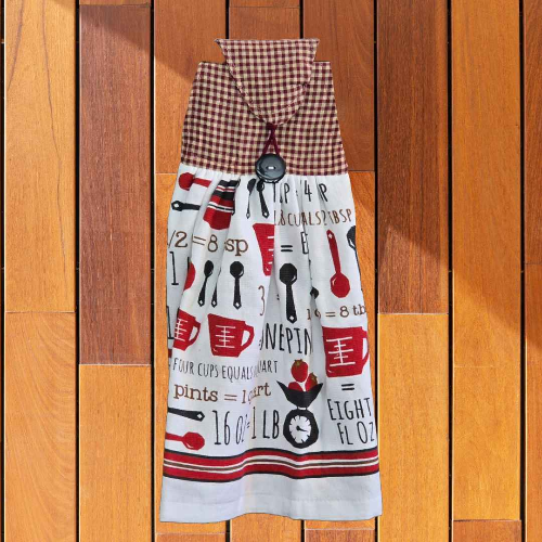 A kitchen towel that is designed to hand on your oven door