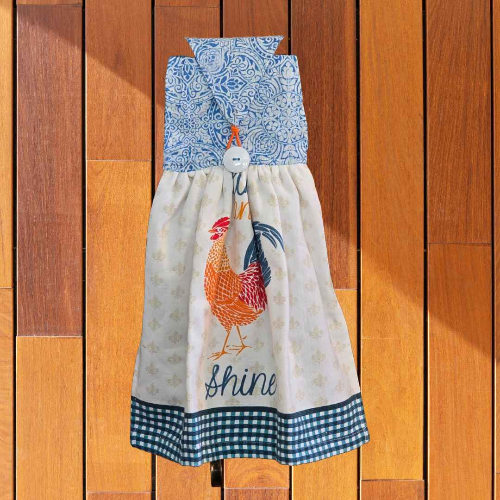 A kitchen towel that is designed to hand on your oven door