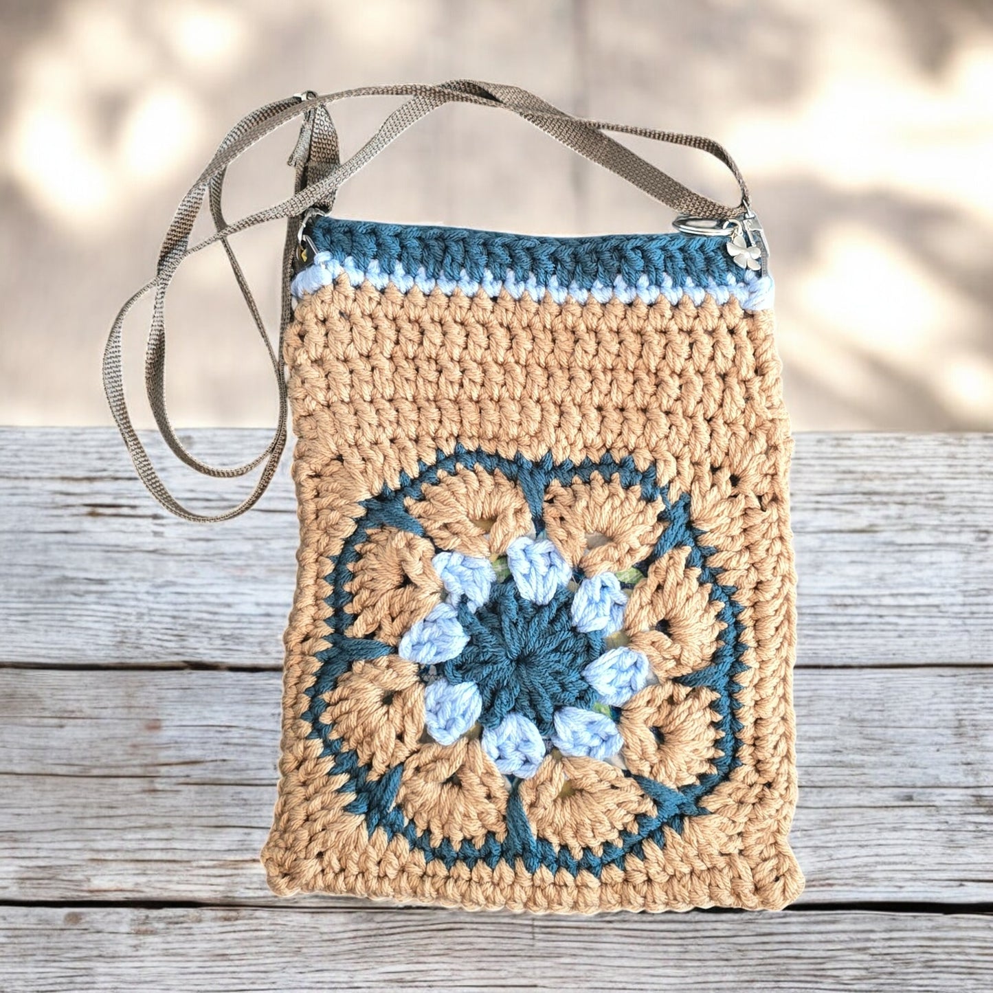Boho Crochet bag with a floral pattern on a dark green background