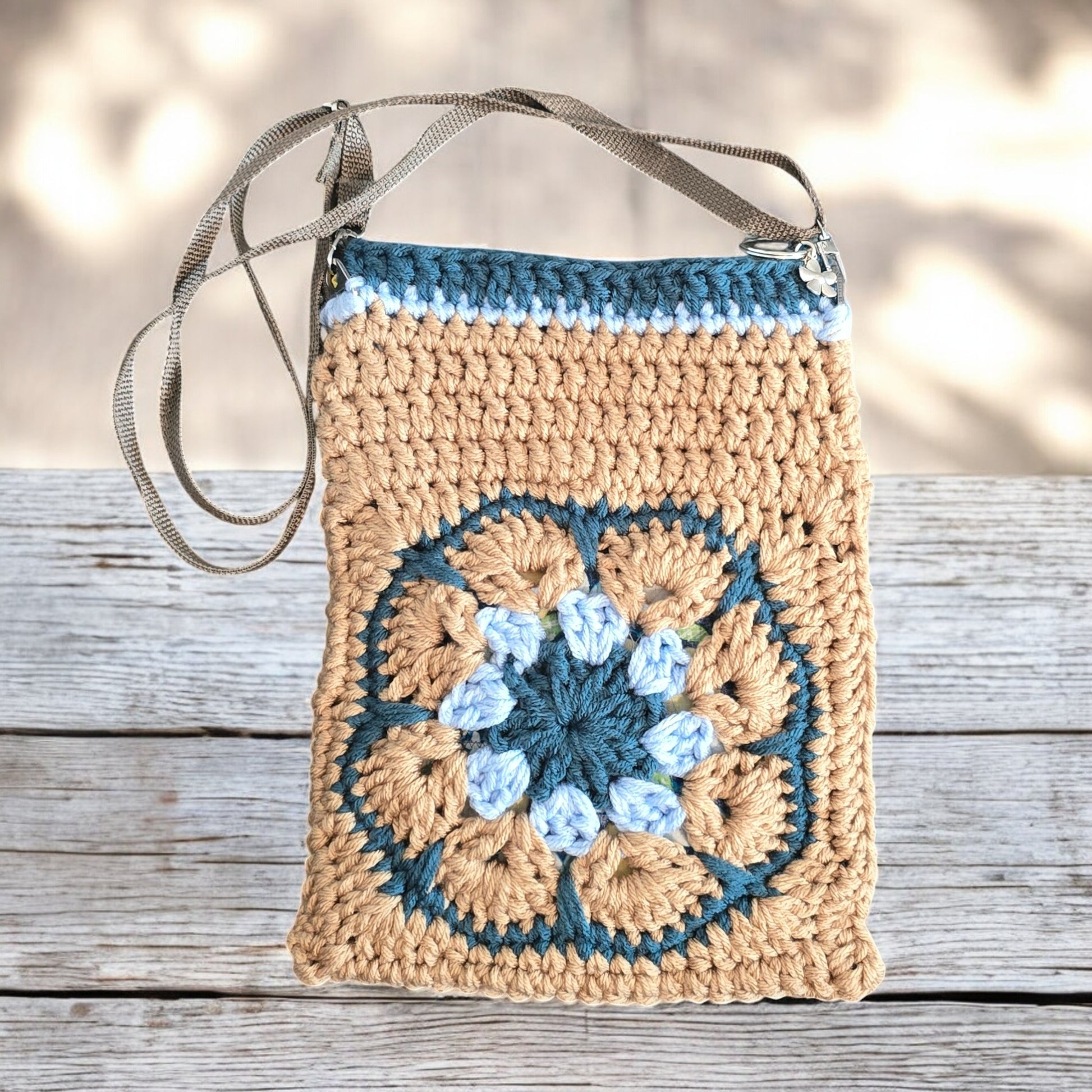 Boho Crochet bag with a floral pattern on a dark green background
