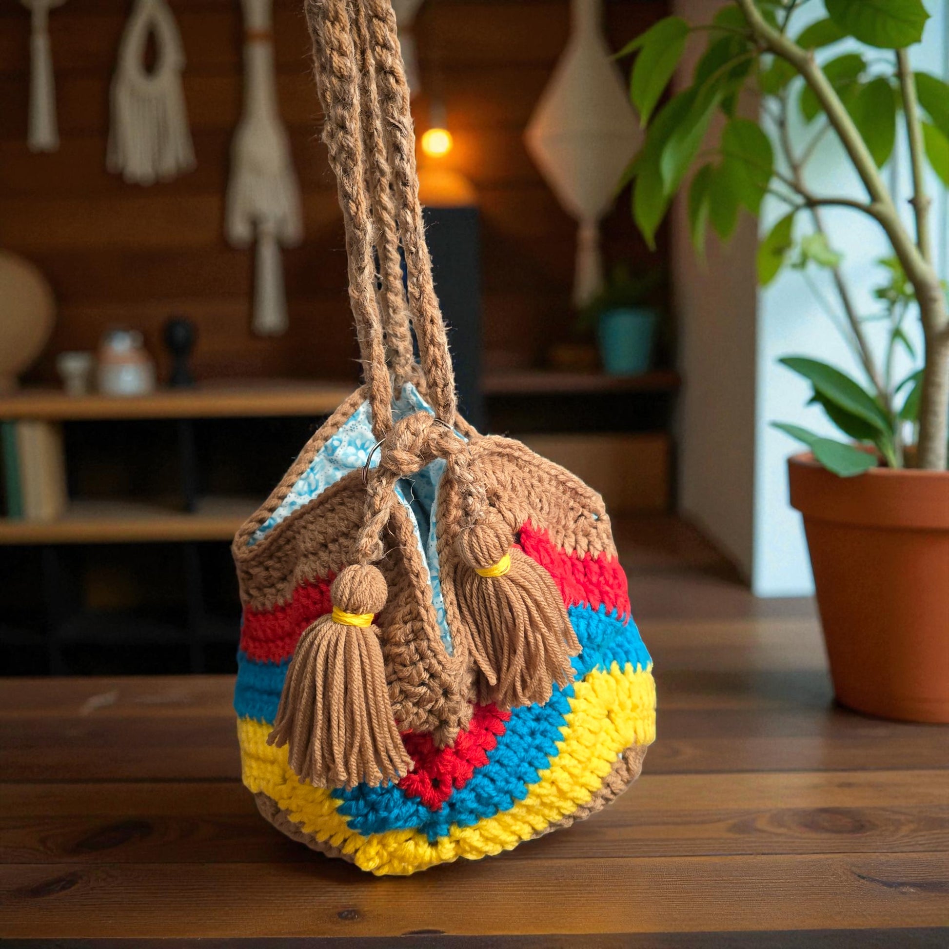 Boho Crochet Bucket Bag Multi-Color Handmade Market SITTING ON A TABLE