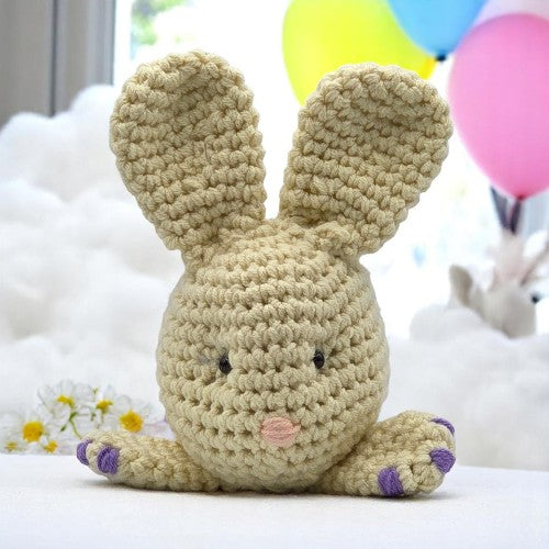 yellow bunny head with big ears facing forward
