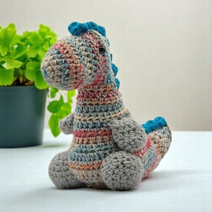 DINOSAUR TOY FACING LEFT multi colored blue red cream