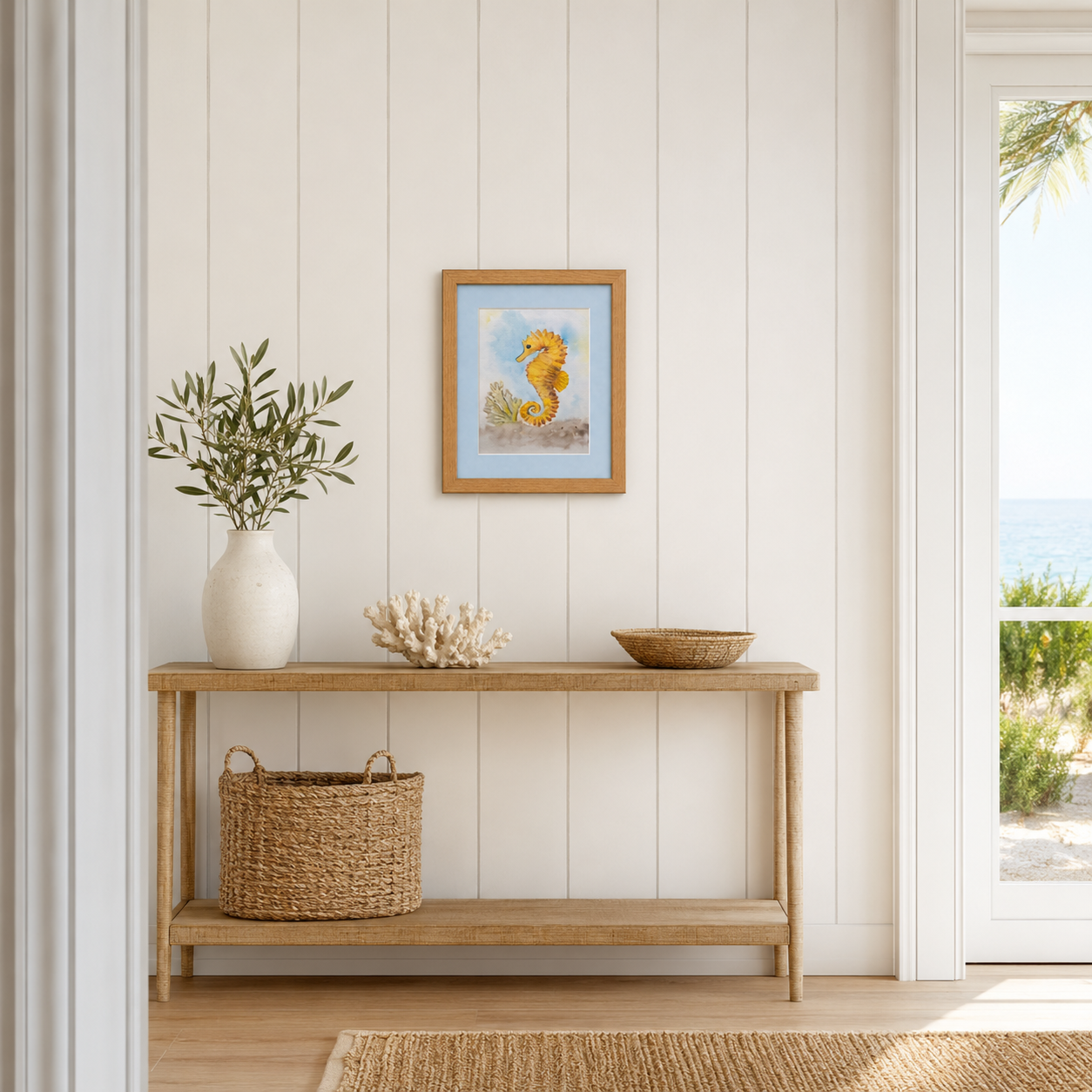 A framed watercolor in a entryway of a golden seahorse