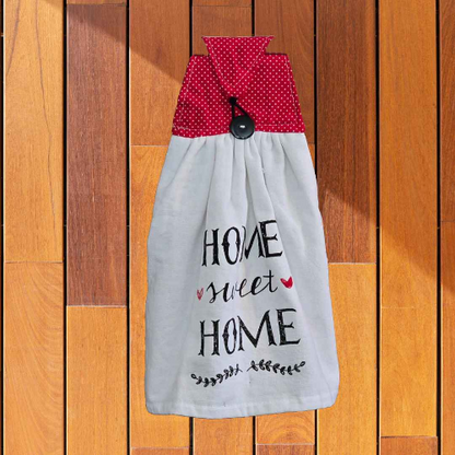 A kitchen towel that is designed to hand on your oven door