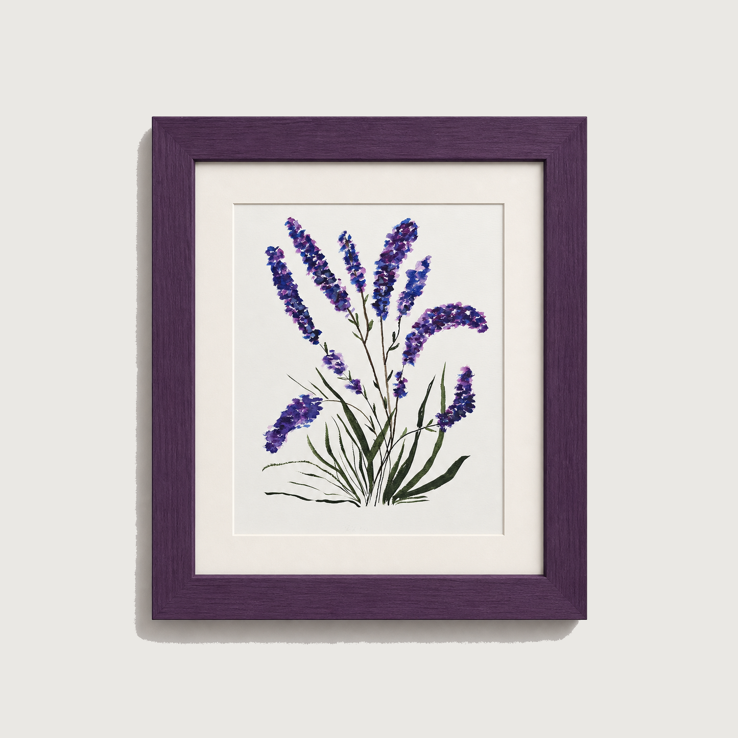 Framed botanical art print featuring purple lavender flowers with green stems on a white mat and background, enclosed in a dark purple wood frame against a light gray wall.