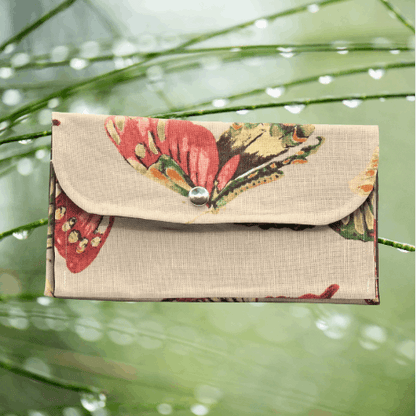 Soft wallet featuring, multiple inside pockets, and a snap closure for secure storage.