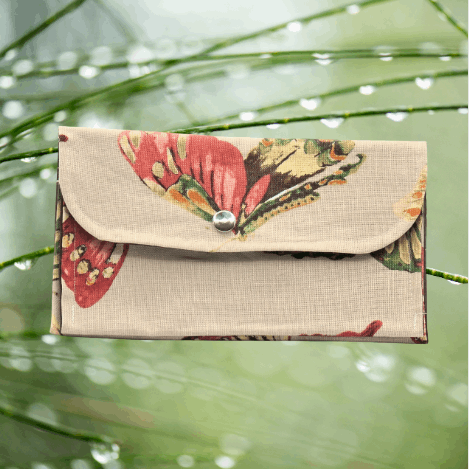 Soft wallet featuring, multiple inside pockets, and a snap closure for secure storage.