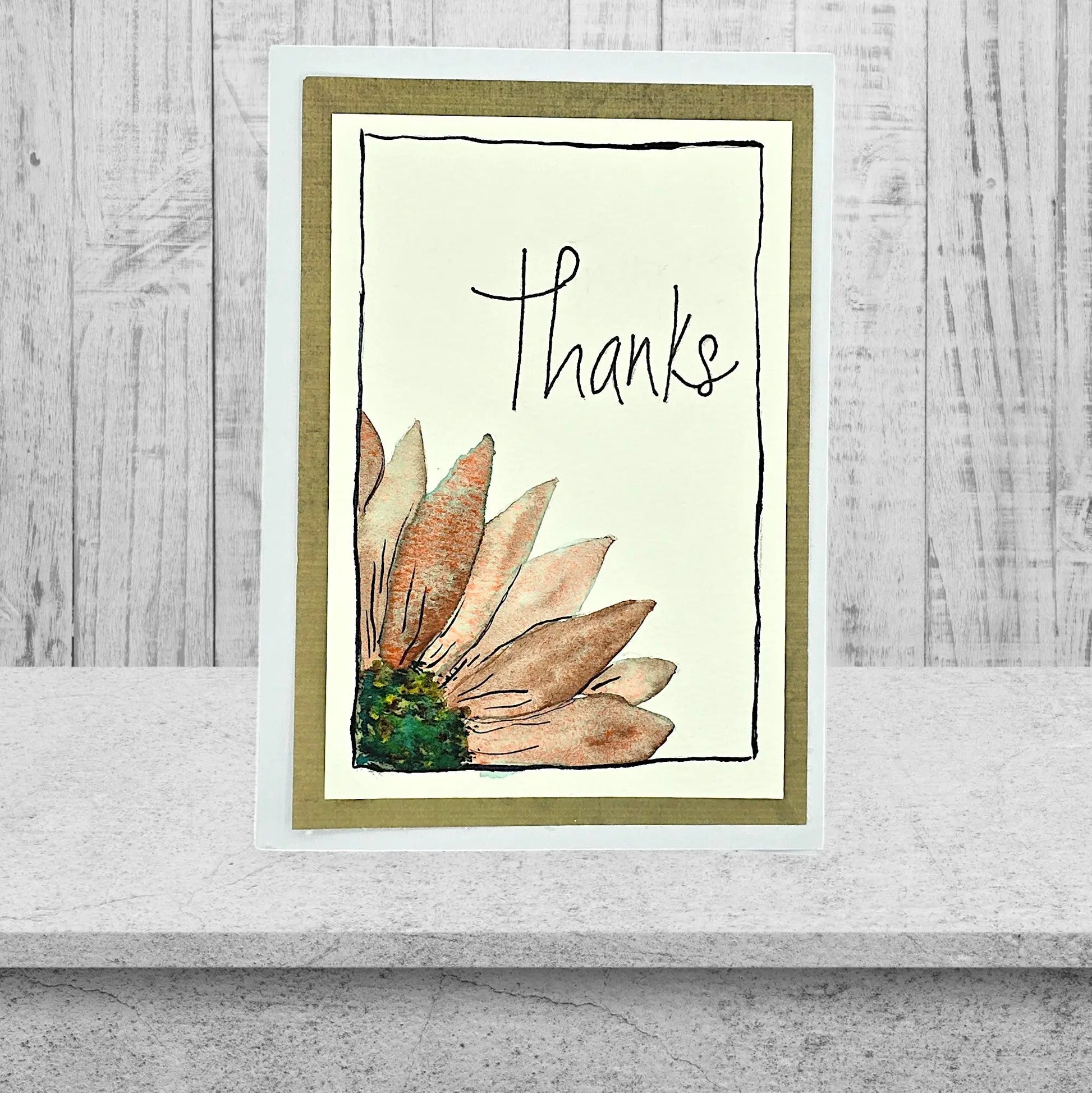 THANK YOU CARD WITH A SUNFLOWER AND THE WORDS THANKS